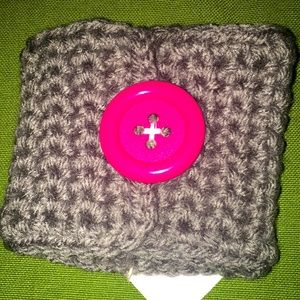 Knit coffee cozy with stylish button